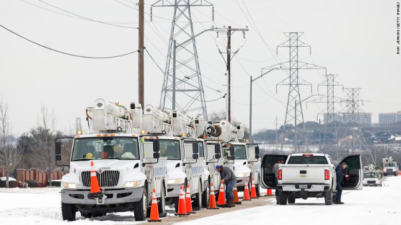 FORT WORTH, TX - FEBRUARY 16: Pike Electric service trucks line up after a snow storm on February 16, 2021 in Fort Worth, Texas. Winter storm Uri has brought historic cold weather to Texas and storms have swept across 26 states with a mix of freezing temperatures and precipitation. (Photo by Ron Jenkins/Getty Images)